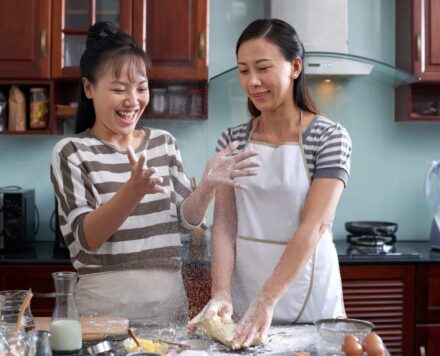 Women Having Fun In Kitchen